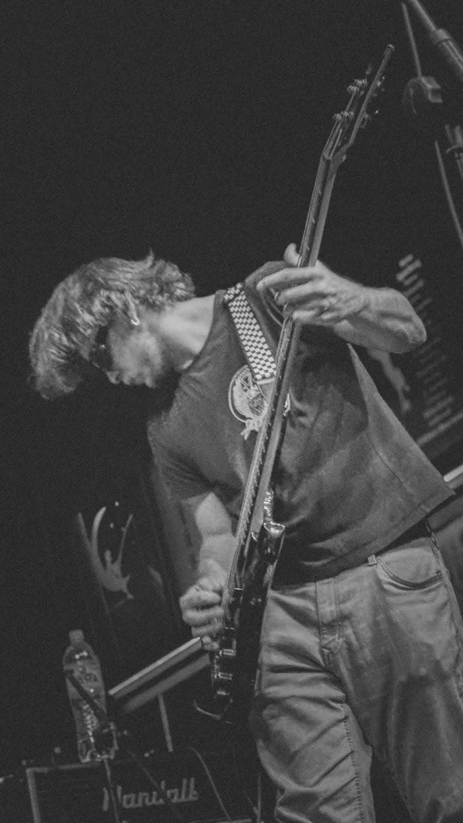 Dario playing bass live with Lepra
